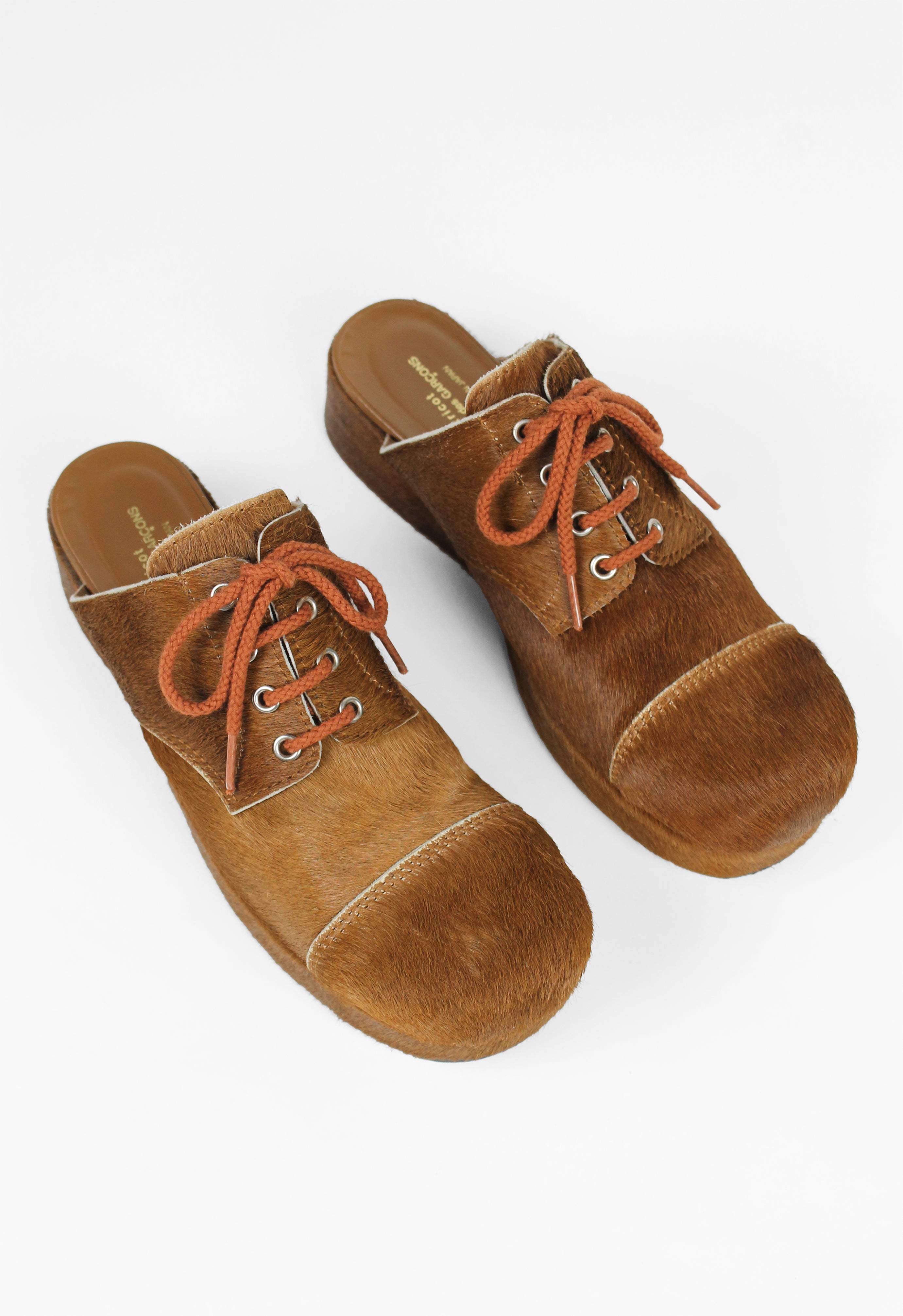 COMME DES GARCONS TRICOT CALF HAIR CLOGS – THE 543