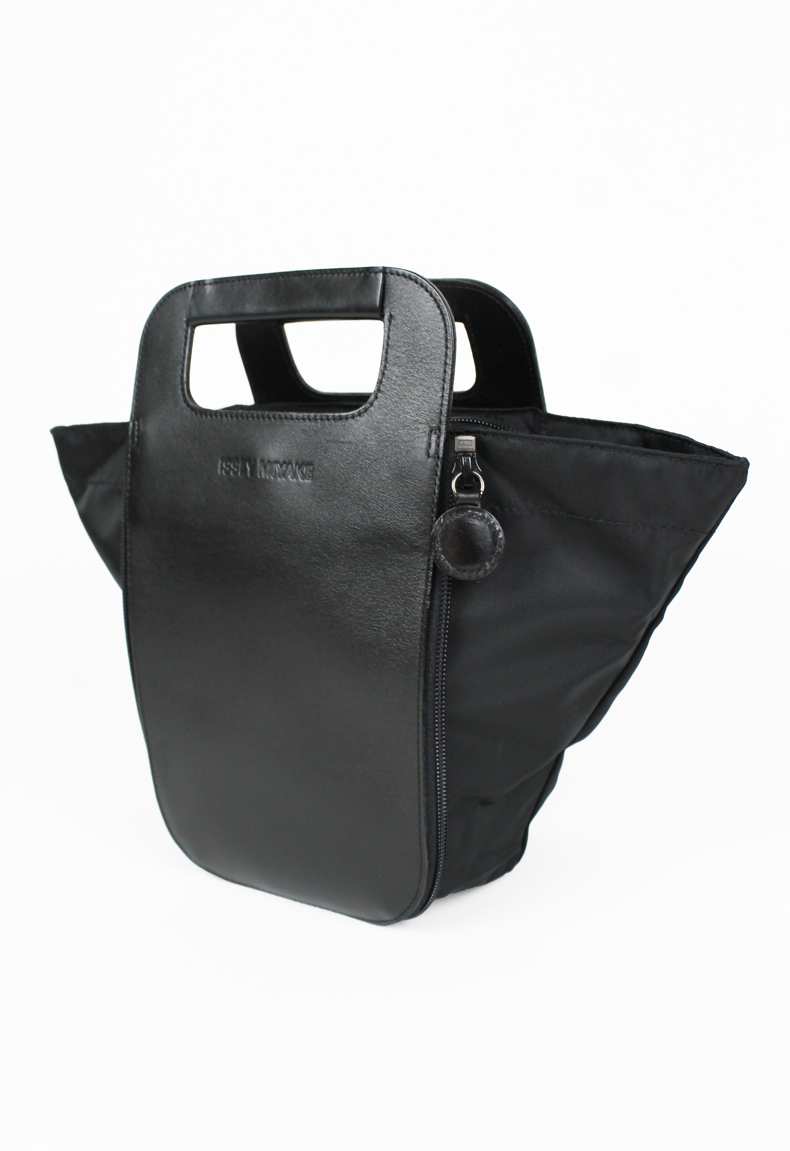 ISSEY MIYAKE 1990'S TRANSFORMABLE LEATHER AND NYLON ZIP BAG
