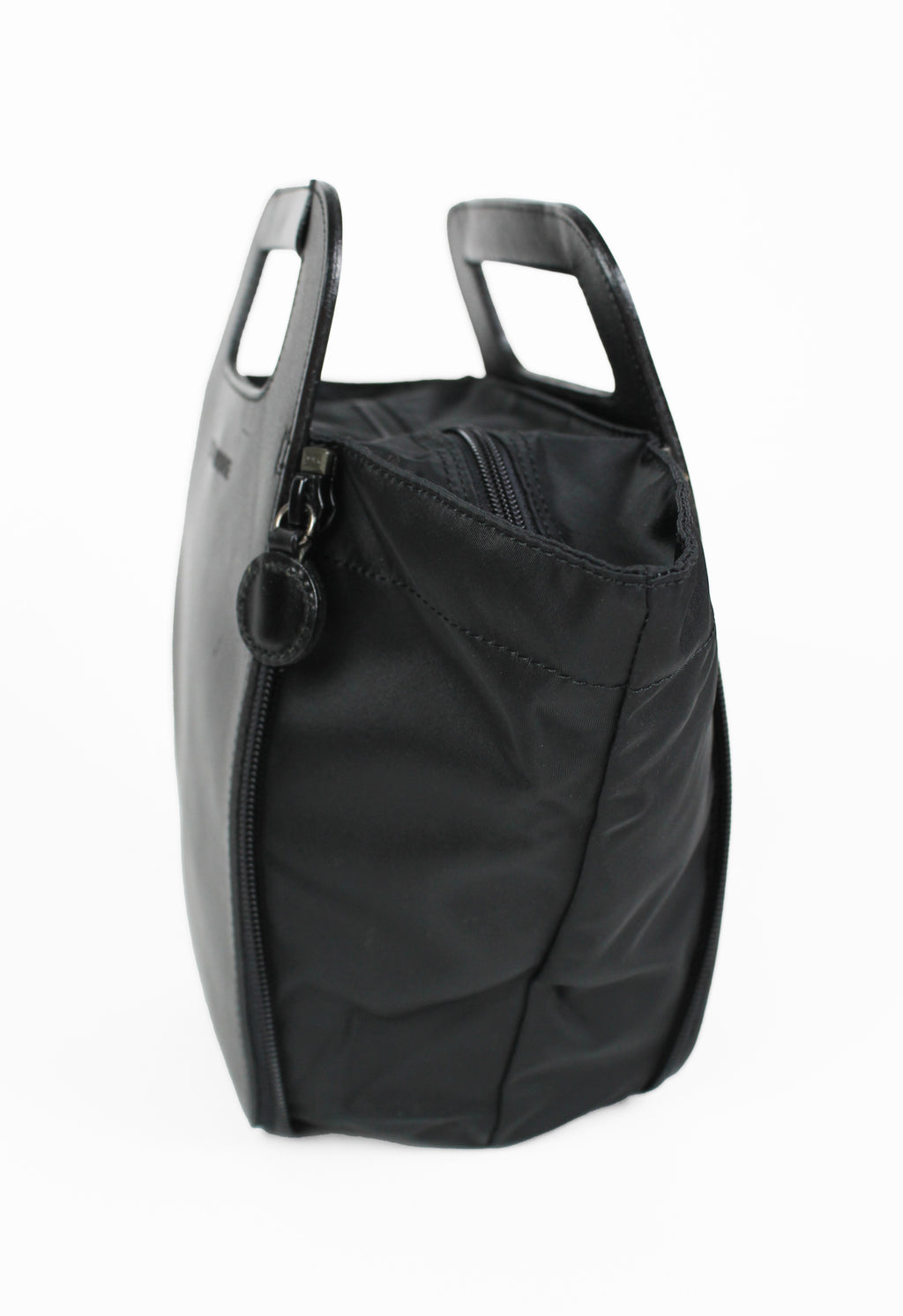 ISSEY MIYAKE 1990'S TRANSFORMABLE LEATHER AND NYLON ZIP BAG