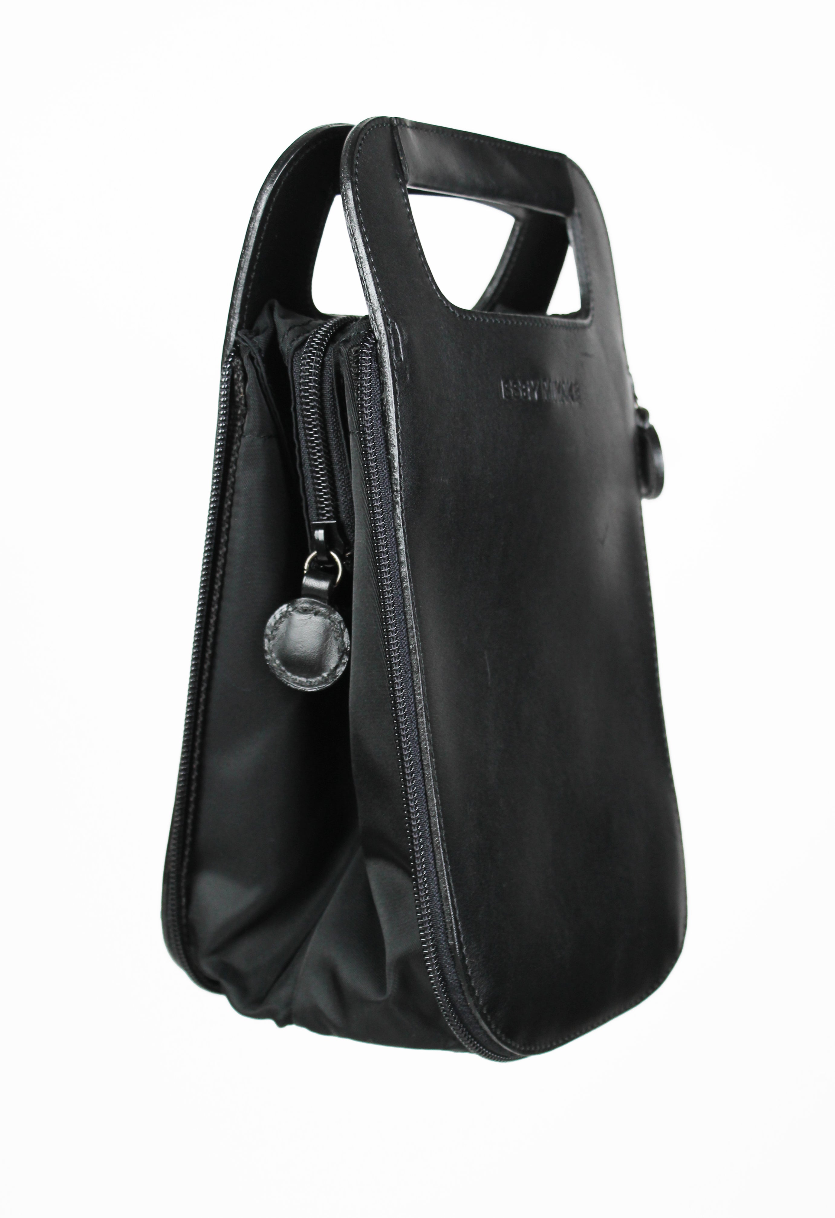 ISSEY MIYAKE 1990'S TRANSFORMABLE LEATHER AND NYLON ZIP BAG