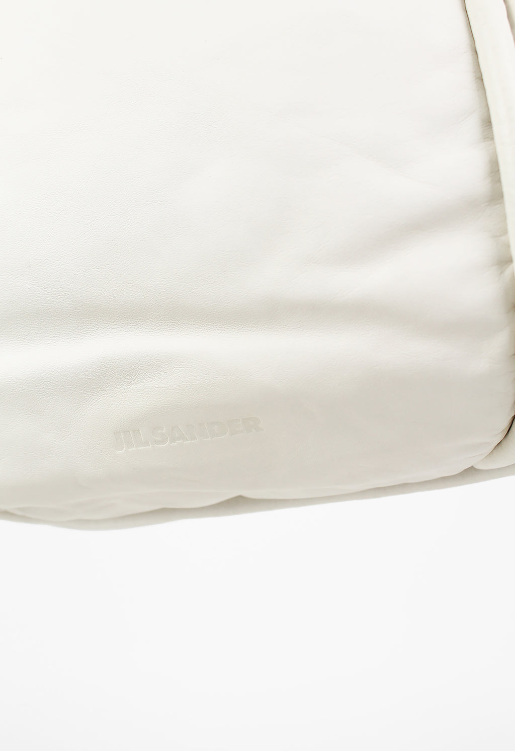 JIL SANDER LARGE CIRCULAR IVORY LEATHER BAG